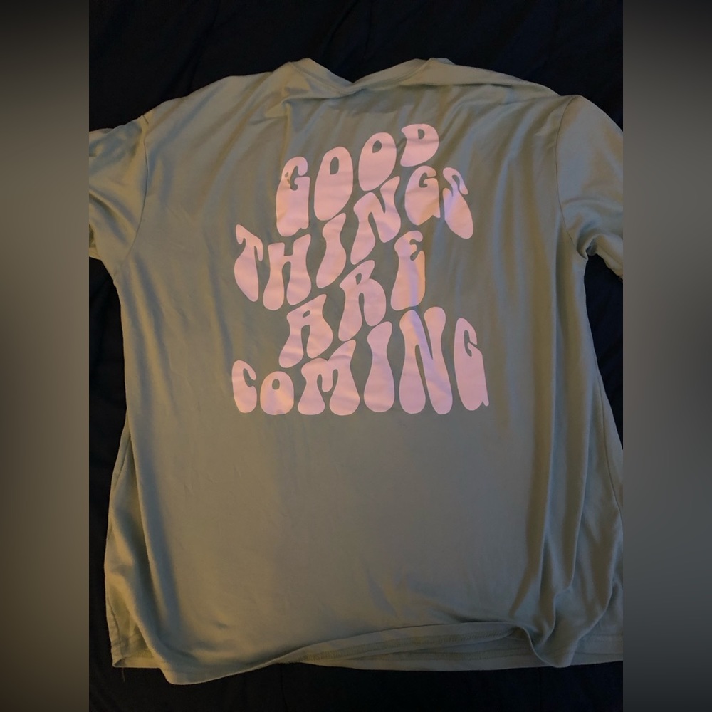 green text shirt